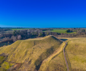 Seredzius mound, hillfort also known as Palemonas hill in Jurbarkas district. Aerial drone view...