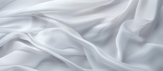 Capturing the intricate details, this image shows a tightly folded white fabric, creating a mesmerizing texture.