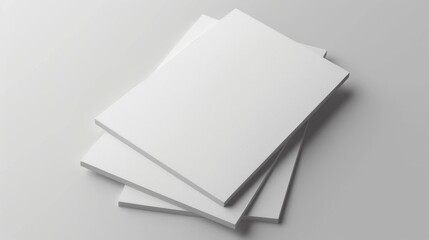 A stack of white paper on a table. Suitable for office or education concepts