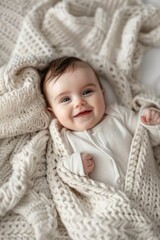 Fototapeta na wymiar Cute baby wrapped in blanket on cozy bed, perfect for family or parenting concept