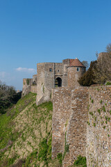 Castle walls and defensive ditch