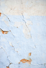 Texture of old plaster. Grunge wall texture. Colored cracked background. Old paint texture is chipping, cracked fall destruction