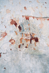 Texture of old plaster. Grunge wall texture. Colored cracked background. Old paint texture is chipping, cracked fall destruction