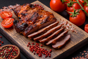 Fresh juicy delicious beef steak on a dark background