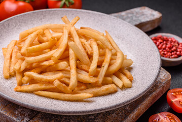 Delicious crispy golden fries with salt and spices - 766604550