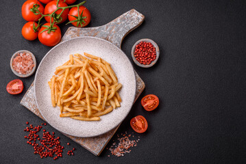 Delicious crispy golden fries with salt and spices - 766604789