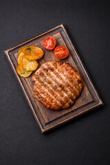 Delicious fresh grilled chicken fillet with spices and herbs - 766610395