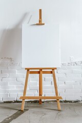 wooden easel mock up with blank canvas on white brick wall - obrazy, fototapety, plakaty