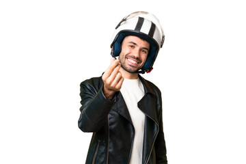 Young caucasian man with a motorcycle helmet over isolated chroma key background making money gesture