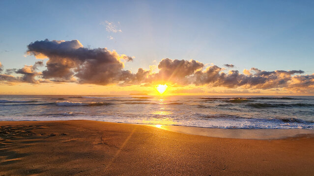 Beautiful sunset on the beach. Seascape with sunbeams © Ahr_2
