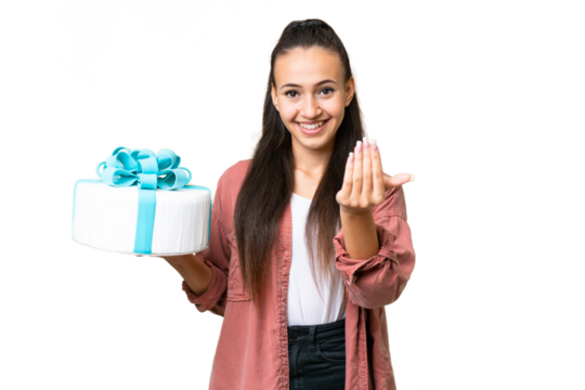 Young Arabian woman holding birthday cake over isolated chroma key background inviting to come with hand. Happy that you came