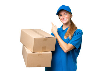 Delivery caucasian woman over isolated background pointing finger to the side - 766620783