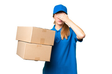Delivery caucasian woman over isolated background covering eyes by hands. Do not want to see...