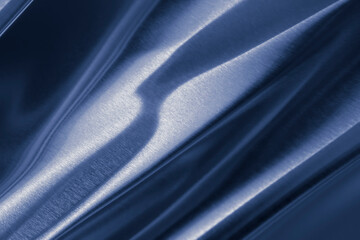 blue bent metal sheet with visible texture. background