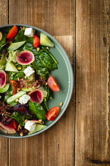 Fresh vegetable salad with cheese. Restaurant food service, menu, seasonal food.