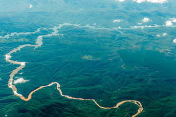 Beautiful nature in Brazilian lands with a lagoon, or river and its curves, seen from the top of an airplane, in aerial photographs © Ronaldo TRS