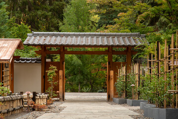 Open wooden gate to Japanese Garden, Lithia Park, Ashland, Oregon, in 2023 - 766636951