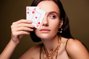 Photo of stunning fancy lady risky poker gamer close eye with two cards royal flash over brown color background