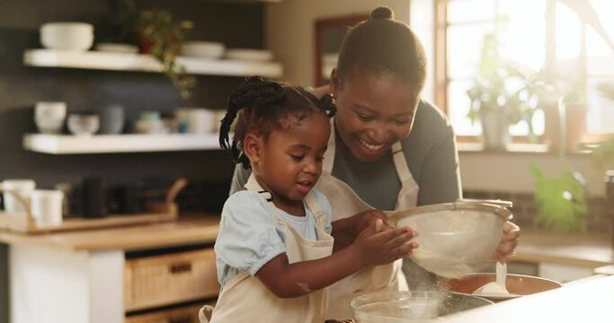 Mommy, daughter and flour for baking in kitchen, education and learning for child development. Black family, home and love for pastry or cake and dessert, cooking and happy while bonding on weekend