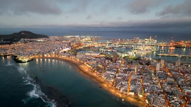 4k Aerial view of Las Palmas de Gran Canaria, the capital city of the Canary Islands. Spain. Playa de Las Canteras beach