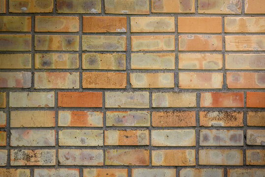 High resolution texture of a yellow brick wall. Laying horizonta 1