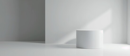 A white cylindrical podium in a light gray room with an infinite background wallpaper banner, providing space for text, mockup, or copy. It is a 3D illustration portraying a minimalistic concept.