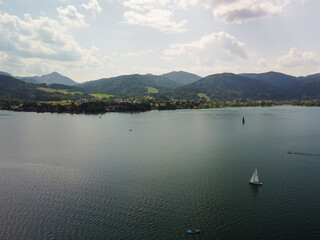 Panoramic view of deep blue Lake Lugano in Switzerland surrounded by mountains