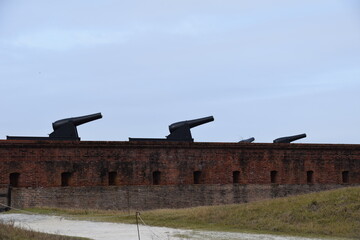old brick fort wall cannons historical battle