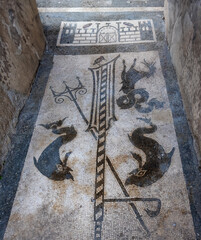 An ancient mosaic floor in Pompeii, Italy