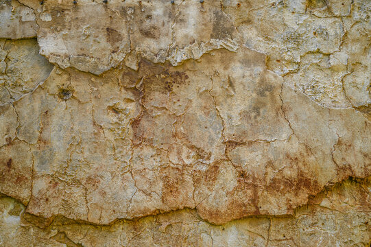 yellow texture of cracked concrete wall. Abstract background of a crack in a concrete wall. 1