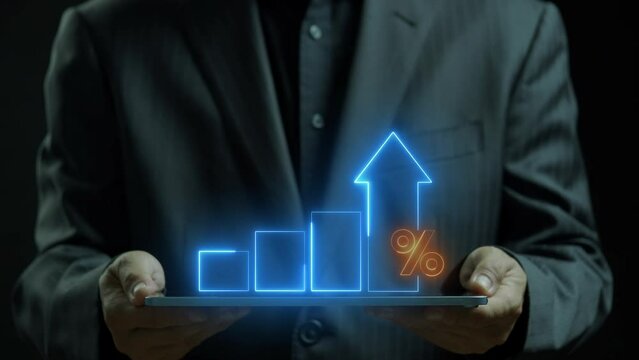Profit high growth percent icon, stocks, financial, Interest rate and dividend concept. Businessman showing glowing glowing neon line animation of graph and chart with percentage icon.