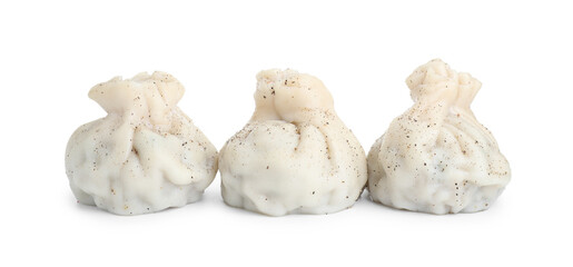 Three tasty khinkali (dumplings) and spices isolated on white. Georgian cuisine