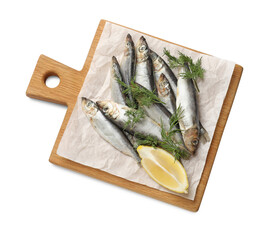 Fresh raw sprats, dill and cut lemon isolated on white, top view