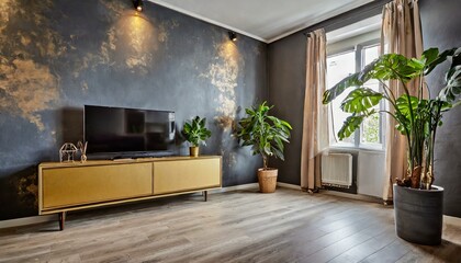 Tv cabinet, gray and gold detailed walls, modern plant. Modern and minimalist looking