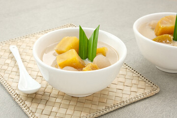 Kolak Ubi, Indonesian traditional dessert, made from sweet potato, coconut milk, sugar and pandanus leaves. 
