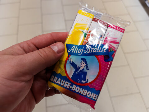 Hand Holding A Packet of Ahoj-Brause Fizzy Candy