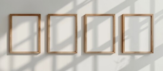 Four square frames with mats, displayed on a white wall. Wooden frame design with a modern, minimalist look for showcasing text or products in an indoor setting.