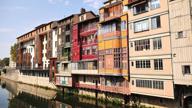 Canal in the middle of buildings in Castres, France