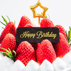 Delicious birthday cake with fresh strawberries, on wooden table and white background. Free space for your text. - 766753937