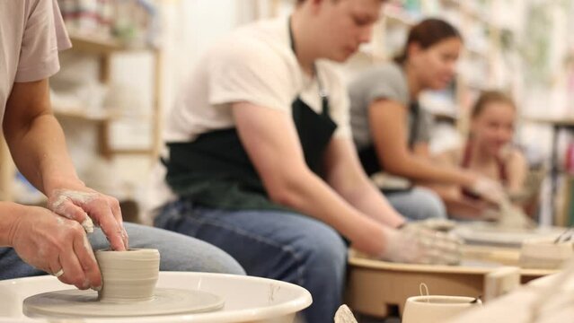 Making clay product on potter's wheel close-up. High quality 4k footage