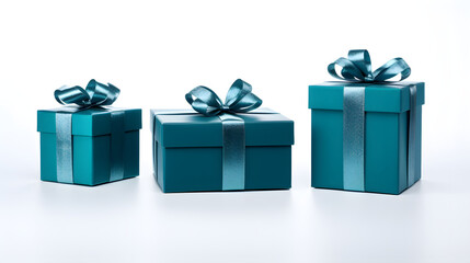 Obraz premium three gift colored boxes tied with a satin ribbon on a white background. holiday gift packaging