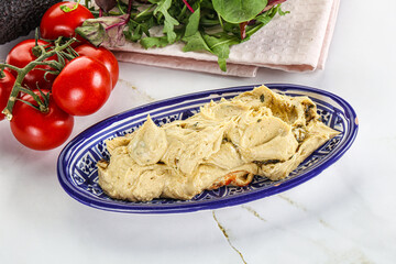 Creamy hummus in the bowl