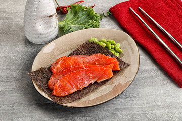 Sliced salmon sashimi in the plate