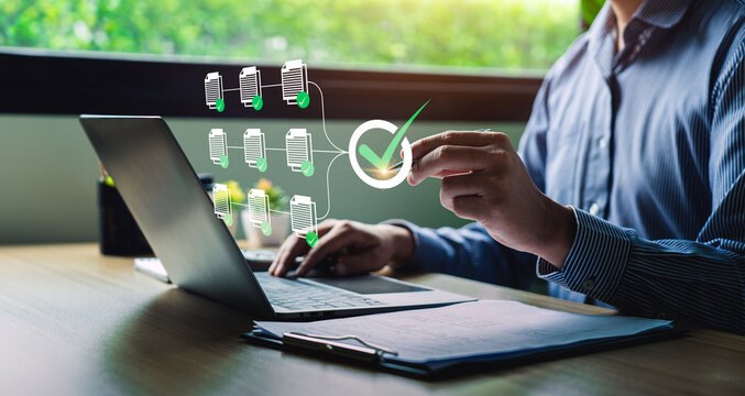 Business performance checklist, businessman using laptop doing online checklist survey, Check marks on checklist and Filling online form or answering questions. evaluation, online survey, online exam.