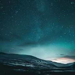 Amazing scenery of green aurora borealis shining in night sky over snowy mountain and sea. Night winter landscape with aurora and reflection on the water surface.