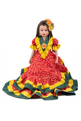 Porcelain doll in Mexican folk dress isolated on white background.