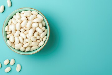 Bowl Filled With White Beans on Blue Table