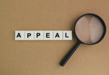 magnifying glass with words of appeal. appeal concept. ask to be released or be released