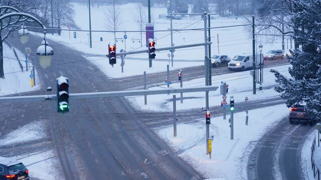 Traffic lights working in the snowy landscape after blizzard - Close shot