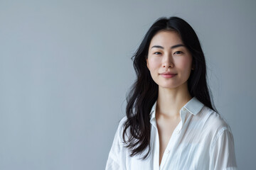 Fototapeta premium Corporate Asian businesswoman portrait isolate from a copyspace background for text